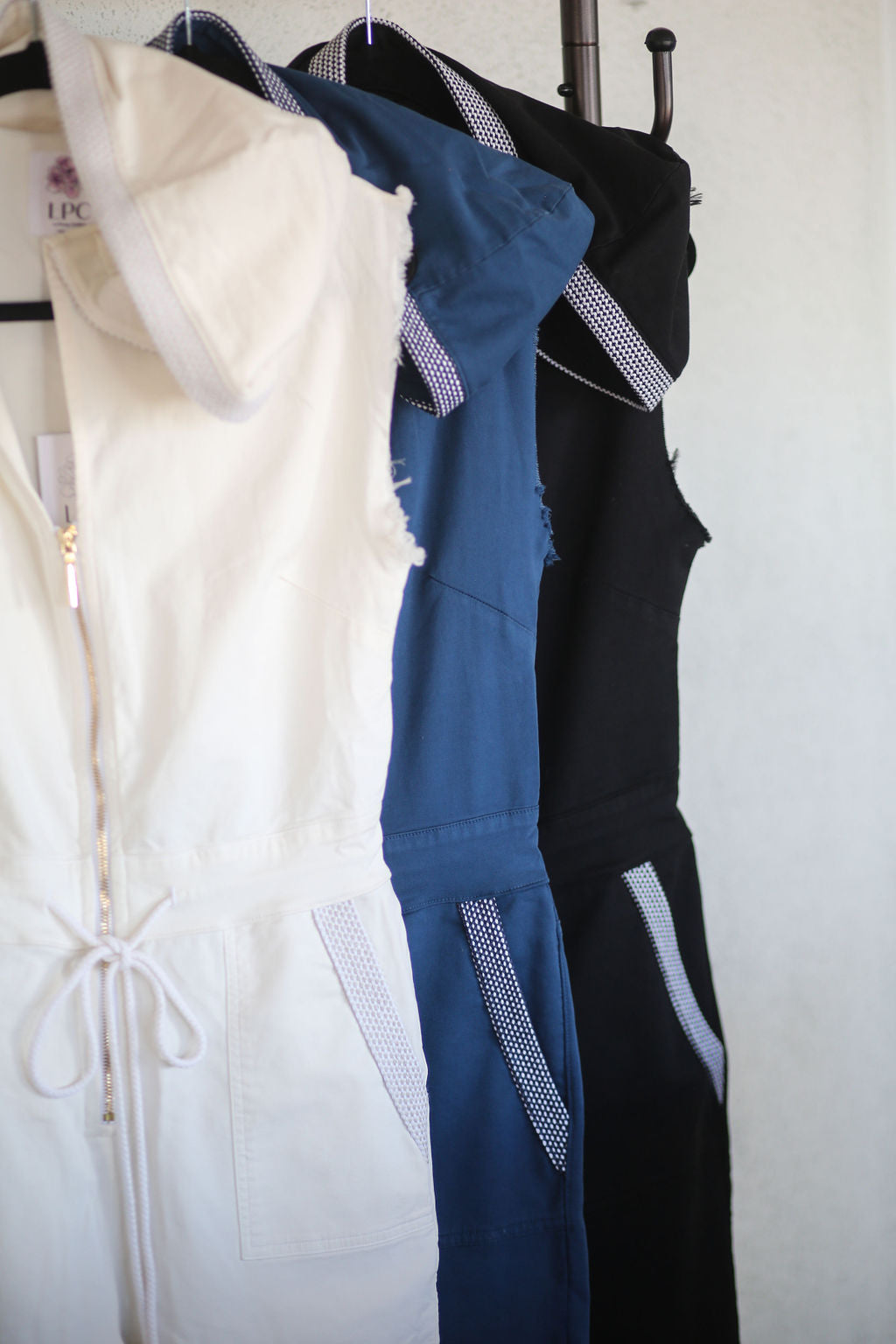 The Carly Hooded Denim Jumpsuit in White