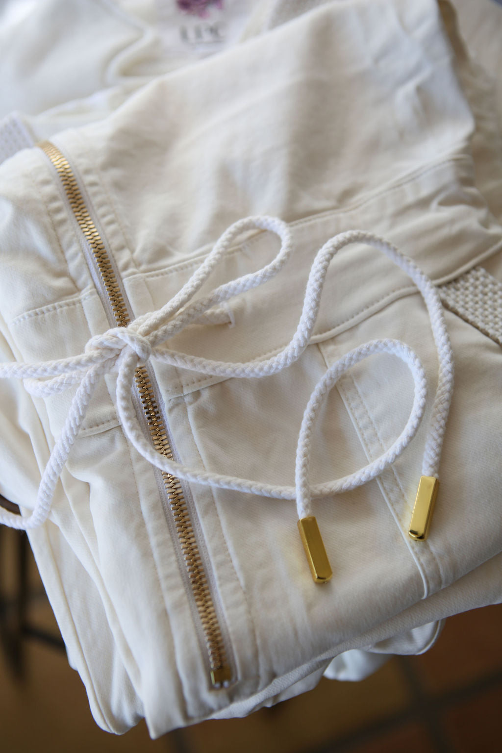 The Carly Hooded Denim Jumpsuit in White